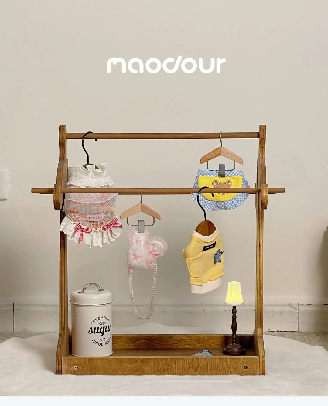 Wooden pet accessory rack styled for a photo studio